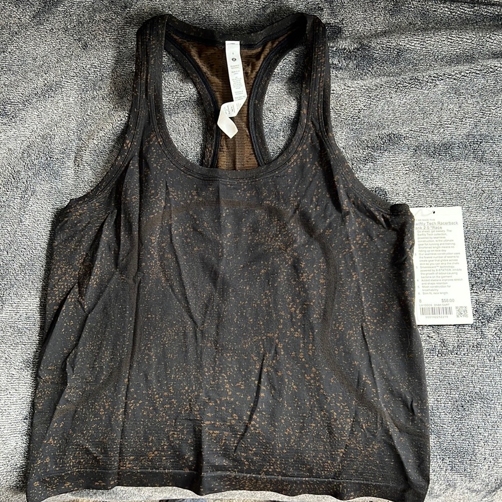 New with tags Swiftly Tech Racerback Tank 2.0 shorter Race length.
